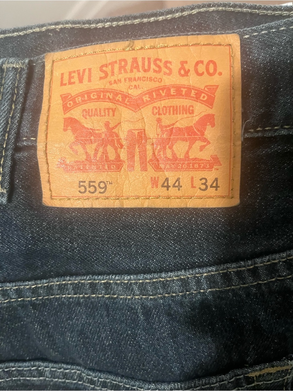 Levi's Men's 559 Relaxed Jeans in Dark Blue Denim with Tan Patch Size W44 L34